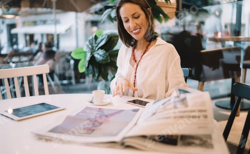 Preview: Successful business woman checking financial economy news from columns in print mass media