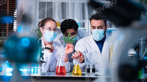 Preview: A group of young scientists are conducting experiments in the lab using a microscope.