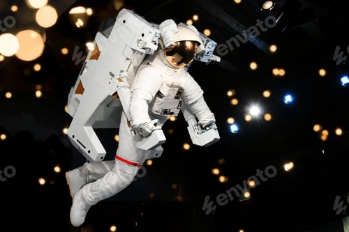 Preview: Display of generic astronaut in flight suit going on spacewalk in science museum