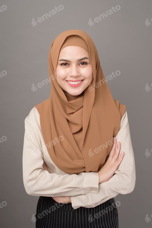 Smiling Woman in Hijab with Arms Crossed