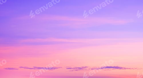 Preview: Dusk sky background with pastel pink clouds on blue evening sky backdrop