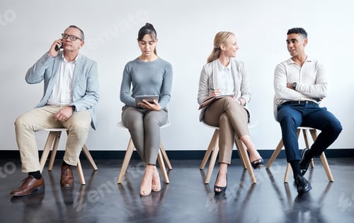 Preview: Make friends who has common goals. Shot of a group of businesspeople waiting in line at an office.