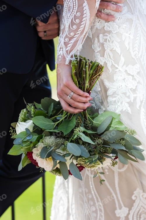 Preview: Vertical closeup of a red and white wedding bouquet