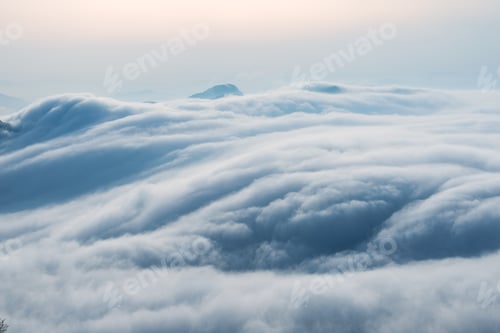 Preview: spectacular waterfall clouds closeup , flowing clouds on mountains in early morning