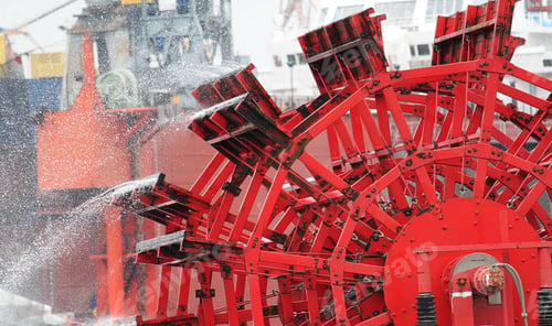 Preview: Closeup of an old red paddlewheel