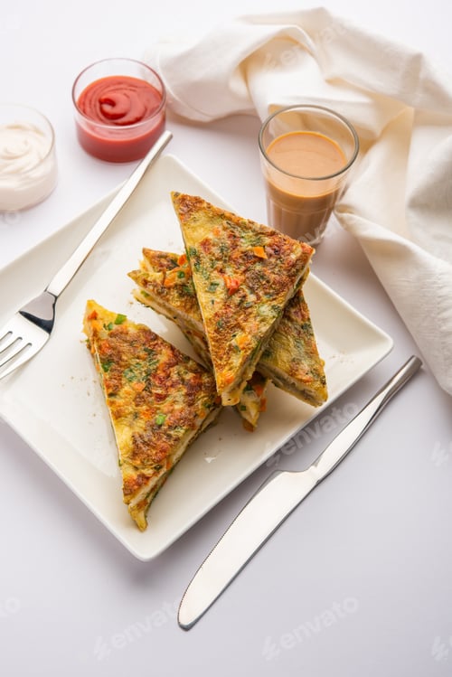 Savory Vegetable Toast Omelet Breakfast with Sauce and Drink