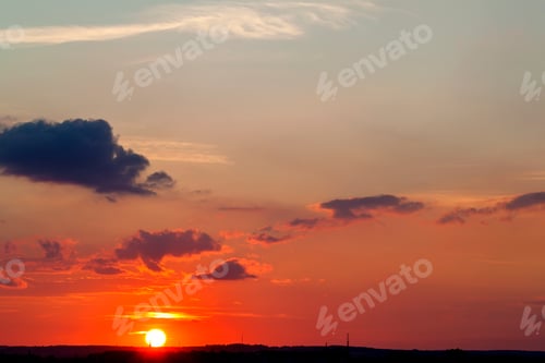 Preview: Abstract nature background. Dramatic and moody pink, purple and blue cloudy sunset sky