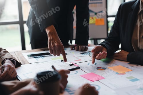Preview: Group of businesspeople working together as a team of analytics point to company graph and chart