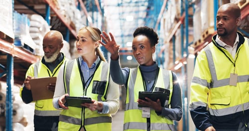 Preview: Warehouse, supply chain and people with tablet in discussion for inspection checklist, export or pl
