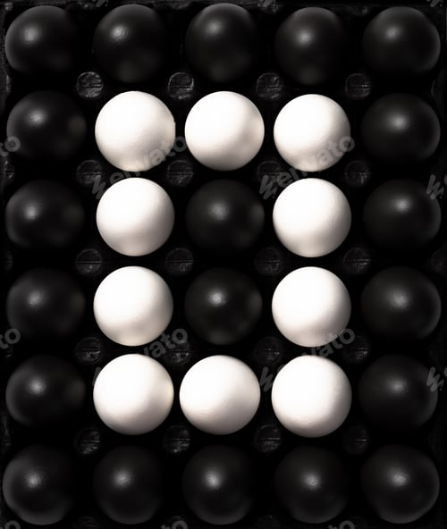 Preview: Black and White Eggs. Cultural Diversity Concept Image. Flat Lay Abstract Pattern