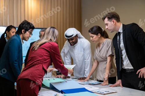 Preview: Group of multi-Ethnic businessman and businesswoman working in office.