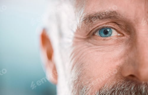 Preview: Cropped shot of an unrecognisable man looking into the camera during a day in the office