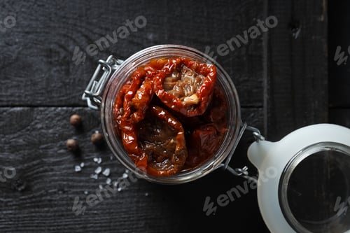 Preview: Concept of tasty food - sun-dried tomato, top view