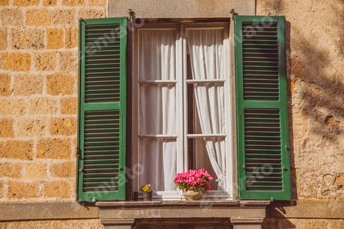Preview: window with flowers on windowsill in Orvieto, Rome suburb, Italy