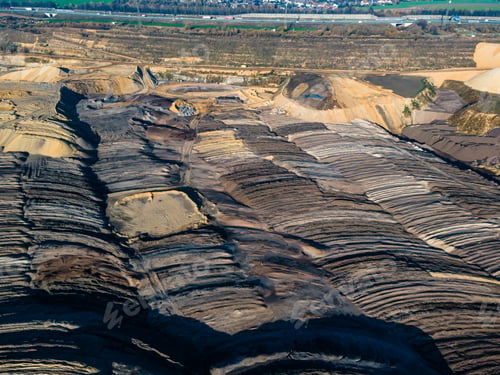 Preview: Mining equipment in a brown coal open pit mine near Garzweiler, Germany. Aerial View