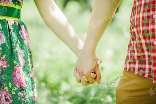 Preview: lovely couple holding hands together