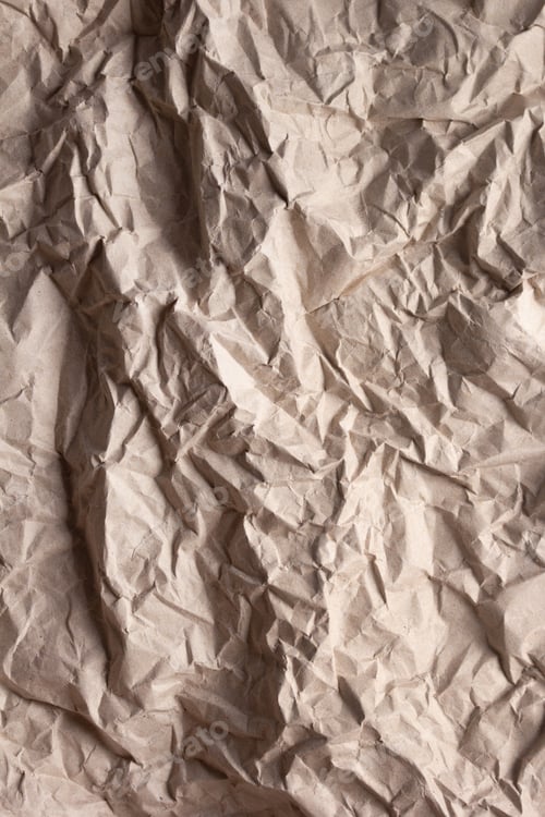 Preview: Crumpled parcel paper background texture. Recycling concept and brown paper