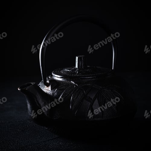 Preview: Black iron teapot over dark background