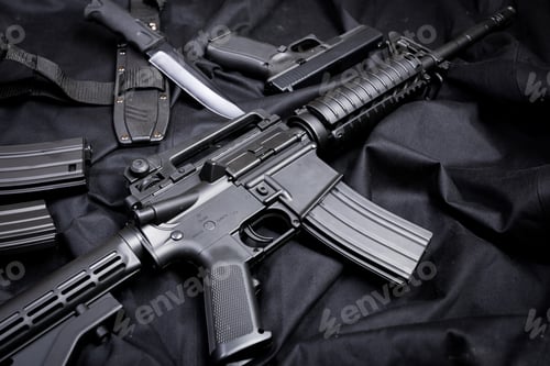 Preview: Rifle, gun, knife with sheath, compass and notebook with pen on on black cloth