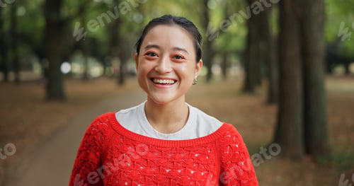 Preview: Portrait, smile and Japanese woman in park with trees, happiness and comfort for autumn fashion. Co