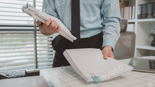 Preview: a businessman is sitting in his private office, an entrepreneur is working diligently