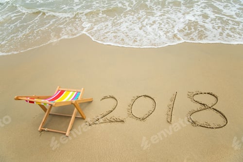 Preview: Deck Chair With 2018 Written In Sand Write On Tropical Beach.