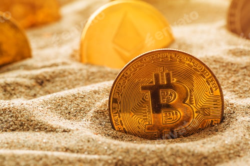 Preview: Golden bitcoin in sand