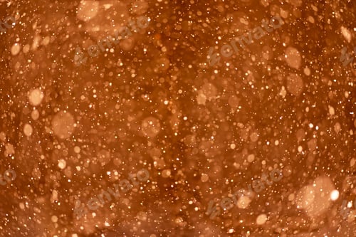 Preview: Beautiful blurry sparkles on orange background. Liquid soap in bottle close up