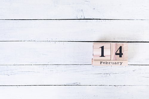 Preview: Valentine day. Wooden calendar with February 14 on it.