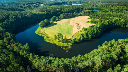 Preview: Aerial view of turning river at sunrise