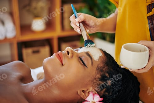 Preview: Woman geting purifying clay mask