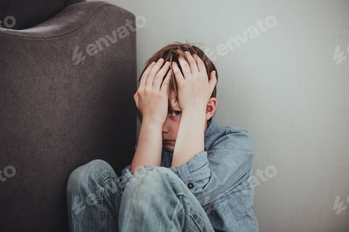 Preview: Scared child boy depressed emotion panic attacks alone sick people fear stressful crying.