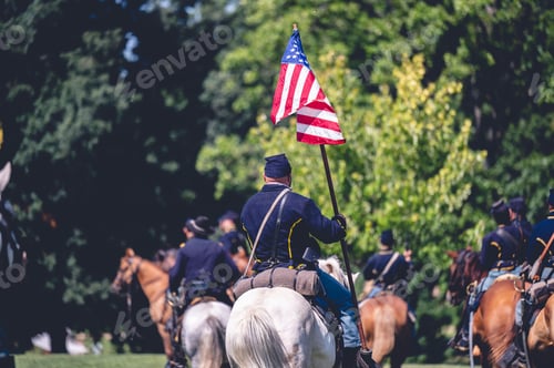 Preview: Soldier riding a horse and raises the flag of America during military performance
