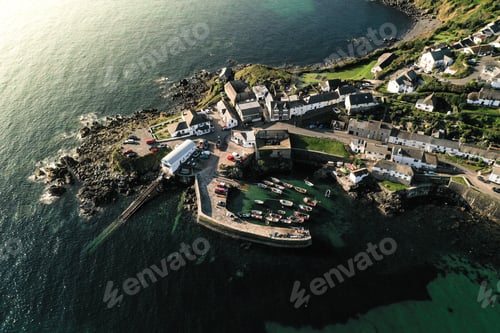 Preview: Aerial landscape of the beautiful fishing village and harbour of Coverack in Cornwall UK