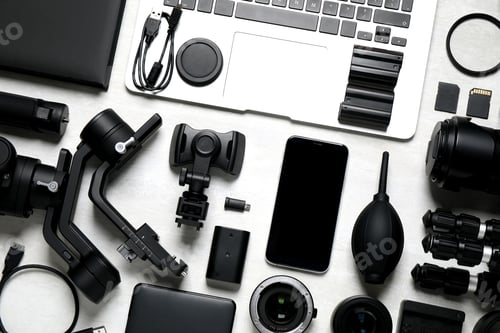 Preview: Camera equipment and accessories for video production on light background, flat lay