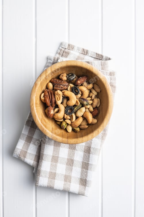 Preview: Overhead Shot of Nuts in Wooden Bowl