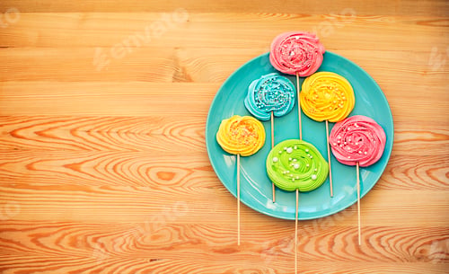 Preview: Colorful lollipops and different colored round candy
