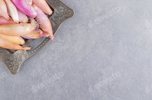 Preview: A tray of ripe onion , on the marble background