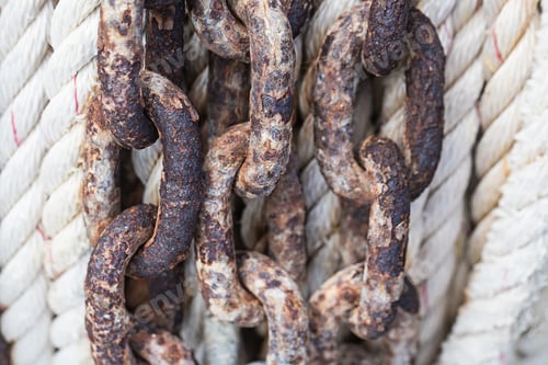 Preview: Rusty iron chain on white background