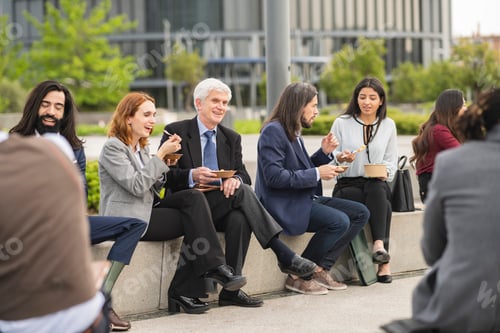 Preview: Colleagues on a lunch break in the financial district park, people of different ages.