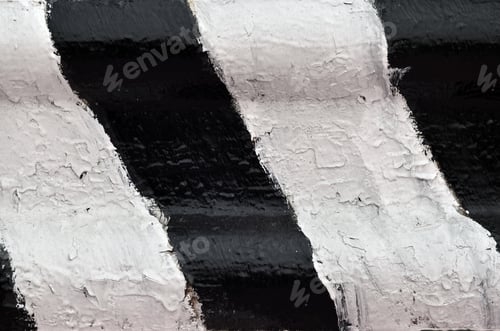 Preview: Close-up view of a metal barrier with striped color