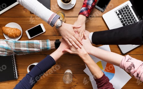 Preview: United hands teamwork in office concept