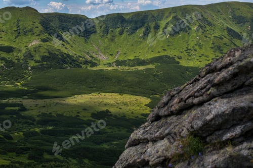 Preview: rocky slopes, alpine vegetation of the Black Mountain Range, Carpathians, Ukraine.
