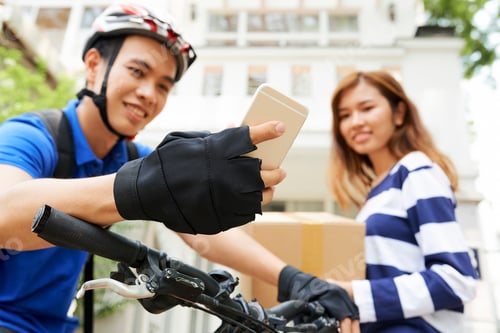 Preview: Delivery man checking app