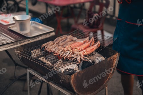 Preview: Squid grilled on a grill at a street market