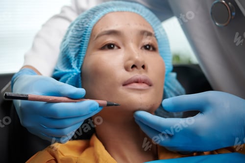 Preview: Doctor Marking Areas on Face