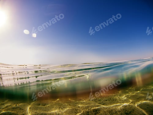 Preview: Seascape water line underwater and blue sky.