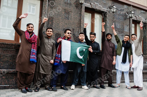 Preview: Group of pakistani man wearing traditional clothes salwar kameez or kurta with Pakistan flags.