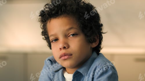 Preview: Close up portrait little sad pensive kid African American ethnic boy son cute offended punished