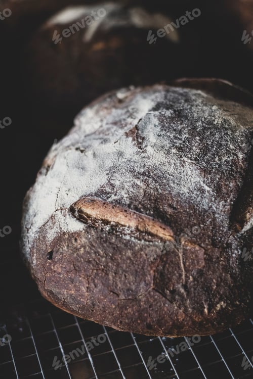 Preview: High angle close up of freshly baked loaves of bread.
